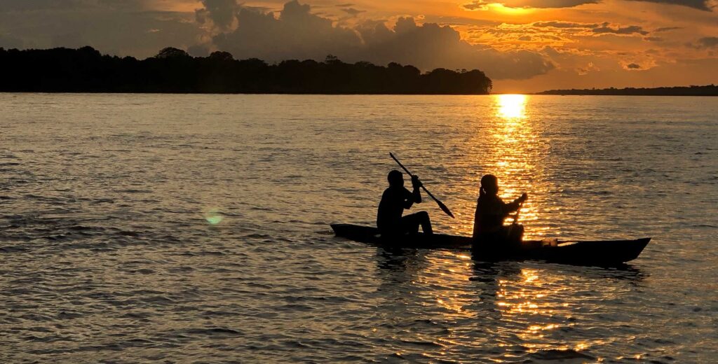 canoeing sunset crop e1655832633192