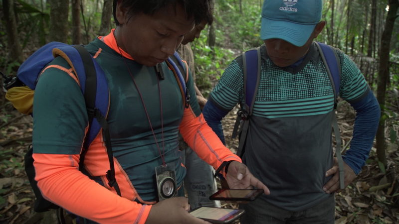 Eliceo Quintero, President of Geoindígena, and Carlos Doviaza, Program Director of Geoindígena, working in the field to detect and document illegal deforestation