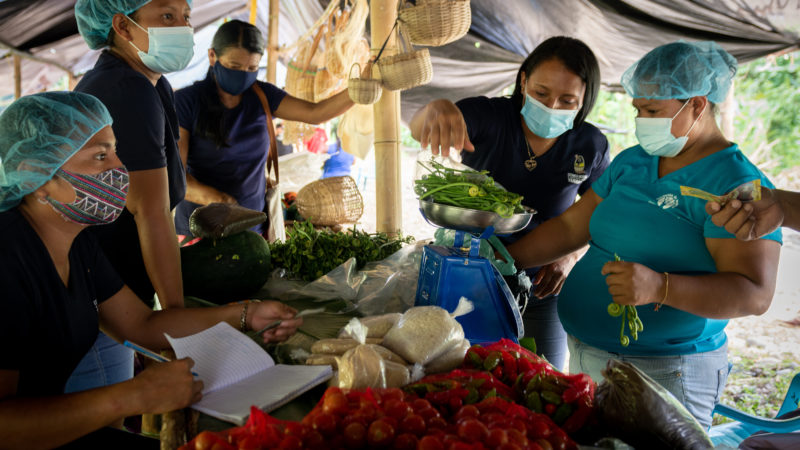 Costa Rican women's association selling produce in local fairs