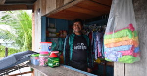 Edico Cuelo in his shop in Puerto Alegre, Peru