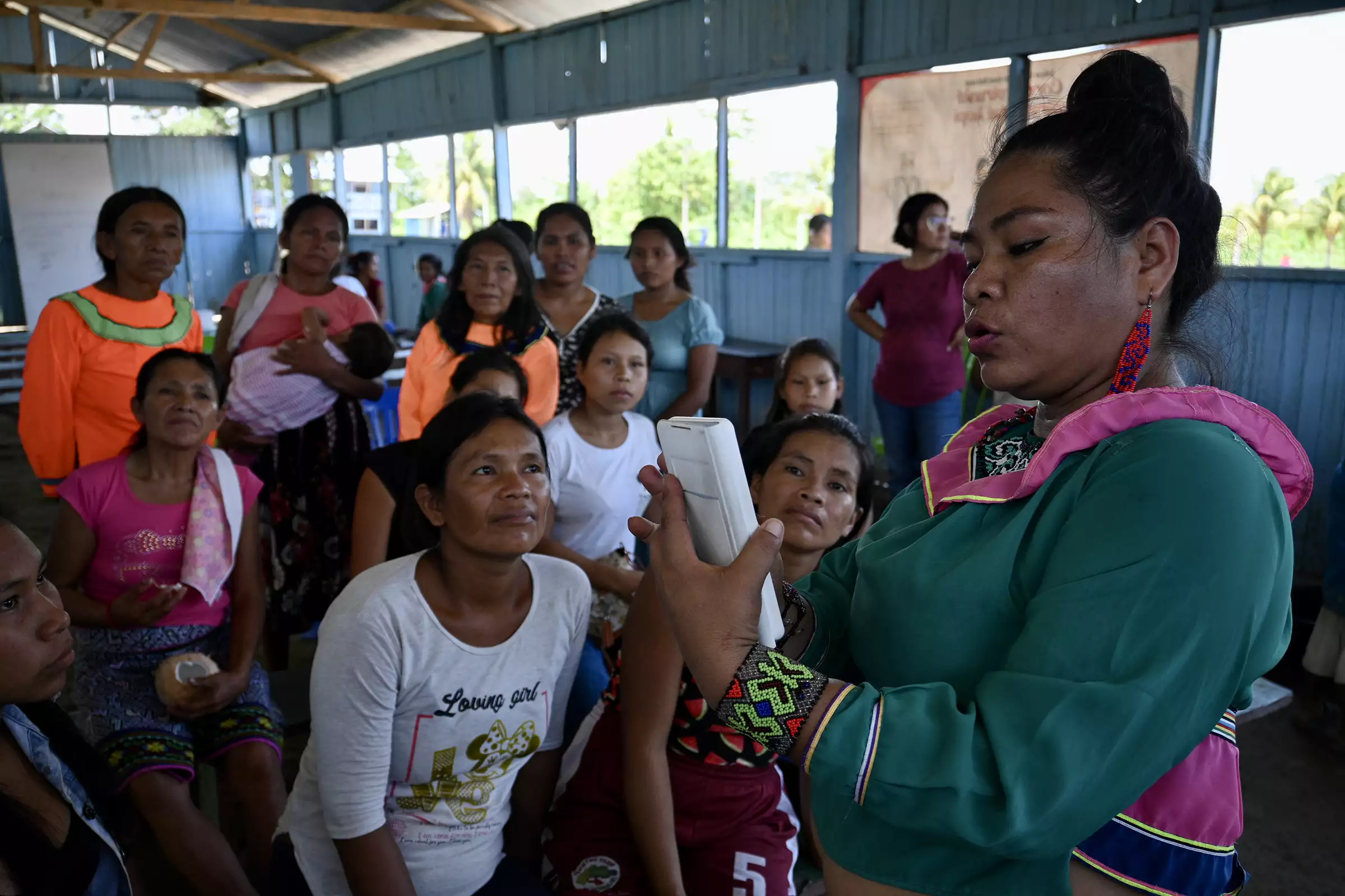 Forest Patrol Instructor Mirian Sanchez explains tech-based forest protection to the women of San Jose de Pacache in Peru