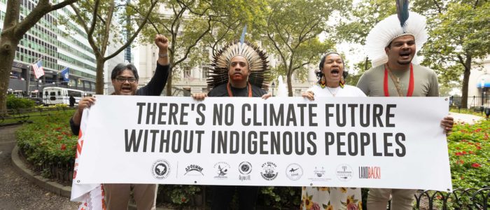 Indigenous rights' activists from the GATC marched through New York City's financial district as part of Climate Week NYC.
