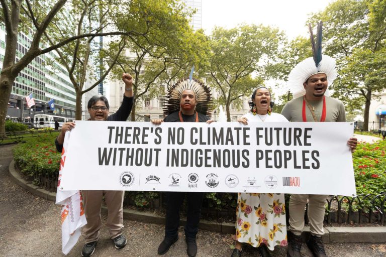 Indigenous rights' activists from the GATC marched through New York City's financial district as part of Climate Week NYC.