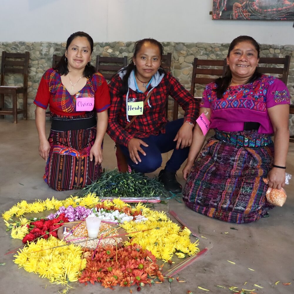 a group of women posing for a picture