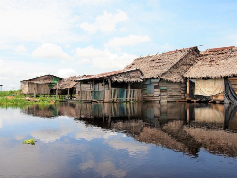 Homes on the Amazon River in Iquitos, Peru
