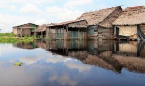 Homes on the Amazon River in Iquitos, Peru