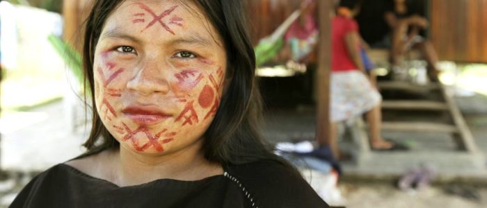 Diana Ríos, daughter of slain indigenous rights activist Jorge Ríos, in traditional red face paint