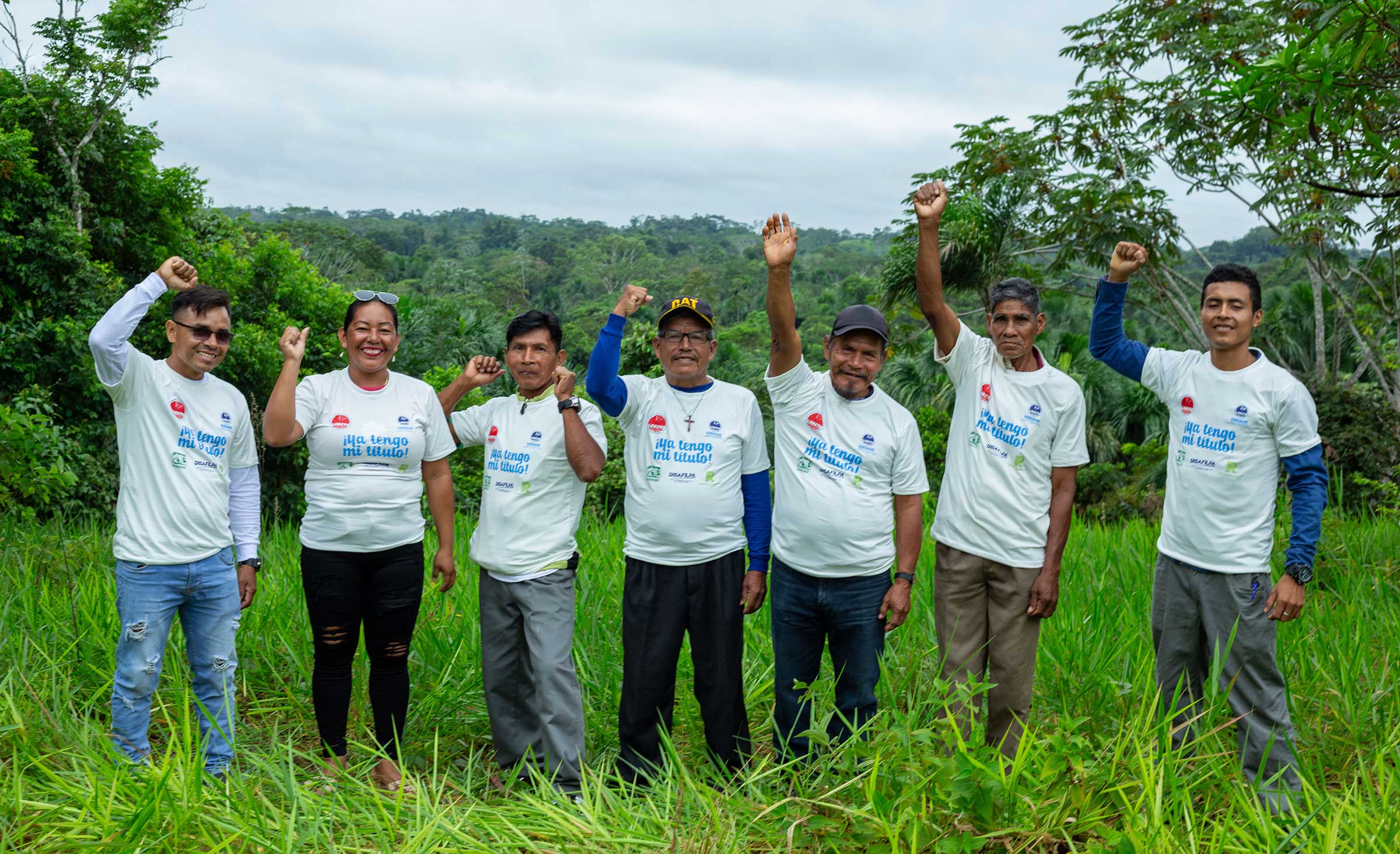 people-in-field-in-row-arms-up-crop
