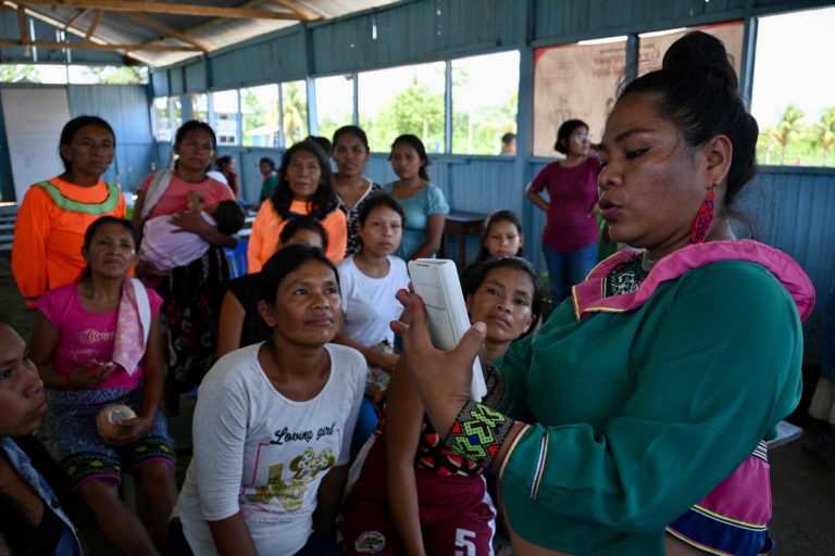 Forest Patrol Instructor Mirian Sanchez explains tech-based forest protection to the villagers of San Jose de Pacache in Peru
